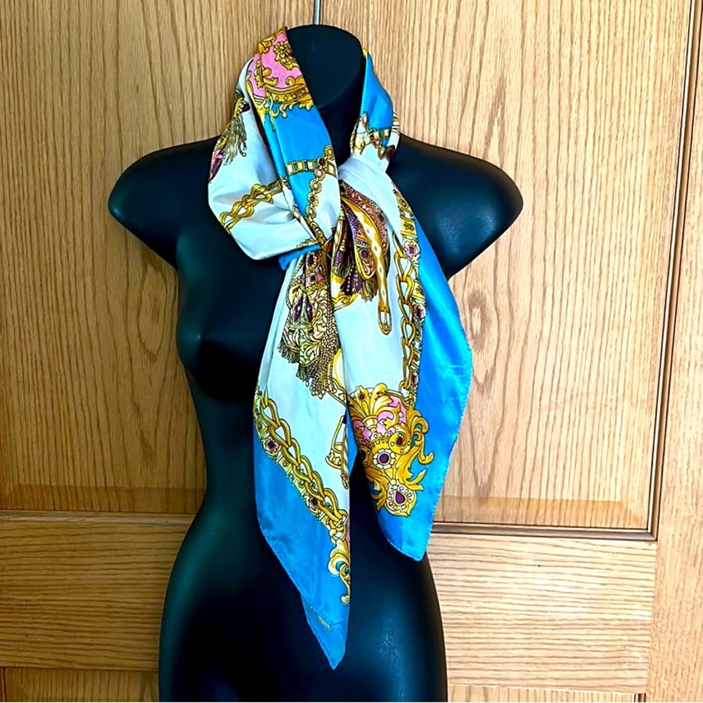 34” x 35” polyester Zhen Qing scarf.